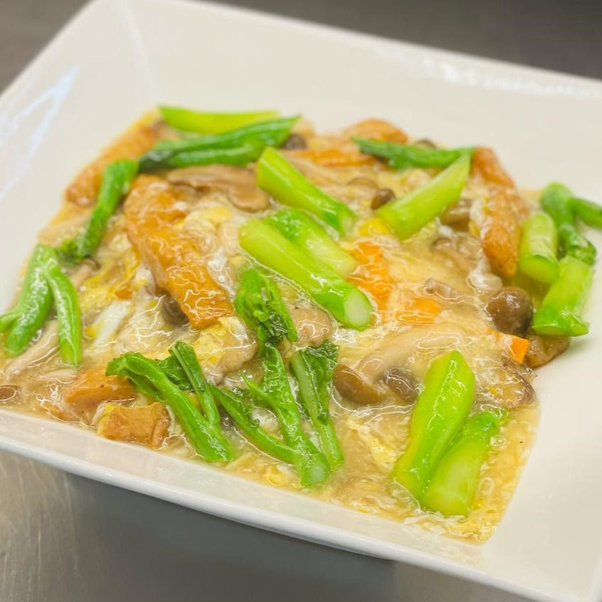 Hor-Fun With Beancurd Sheet, Mushroom And Kailan In Egg Wash Sauce